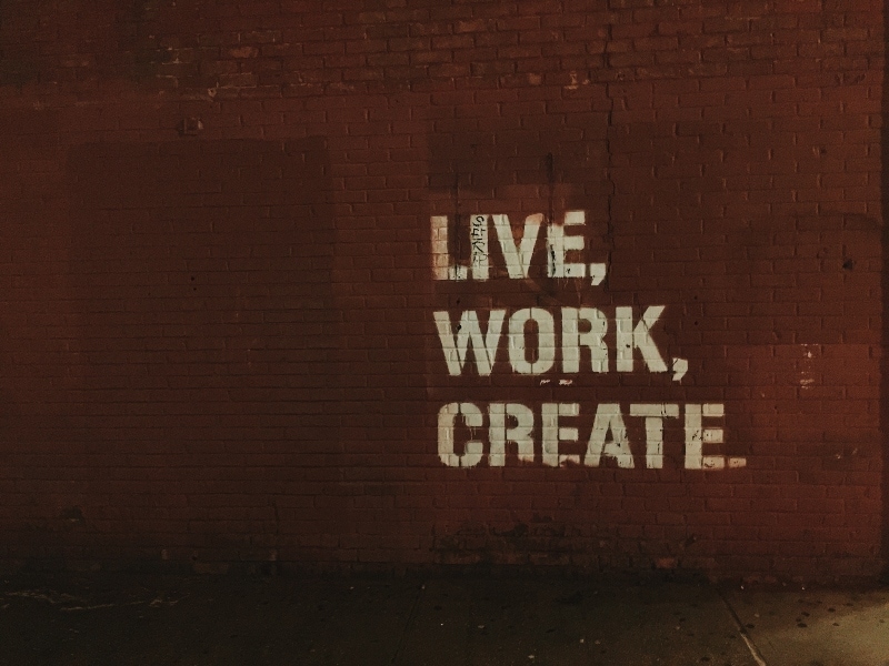Live Work Create Words Against Brick Wall